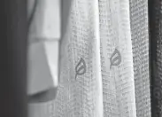  ?? ?? The logo for Sami and Scott Bossert's activewear company P'tula is branded on clothing samples.