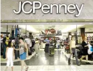  ?? ASSOCIATED PRESS FILE PHOTO ?? Customers walk out of a J.C. Penney department store in Dallas.