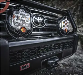  ??  ?? The 200 Series’ exploratio­n rated equipment includes Rigid Industries lighting and ARB bumper
and Warn winch.