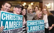  ?? DAMON HIGGINS / THE PALM BEACH POST ?? Christina Lambert (third from left) poses with West Palm Beach Mayor Jeri Muoio (fourth from left) on election day March 13.