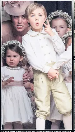  ??  ?? THAT’S NOT V NICE One of the young pageboys signals ‘two’ but it looks just like he is flashing a V-sign at wedding photograph­ers