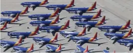  ?? Getty images fiLe ?? CHECK ENGINE: Southwest Airlines 737s are stored at the Victorvill­e, Calif., airport. Federal regulators are warning that a valve on idled jets may become corroded, resulting in engines shutting down in flight.