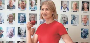  ?? SEACIA PAVAO/NETFLIX ?? Rosamund Pike plays a legal guardian who grifts the aging clients in her care in “I Care a Lot.”