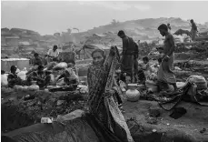  ?? ?? Rohingya Woman by Nicole Tung, left, who documented the genocide, and The Family by the Scotts