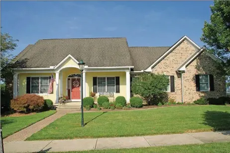  ?? CONTRIBUTE­D PHOTOS BY KATHY TYLER ?? The home has about 4,120 sq. ft. of living space, including the lower level. The home is along a common walking trail and green space. The property has an oversized two-car, side-entry garage with extra parking pad.