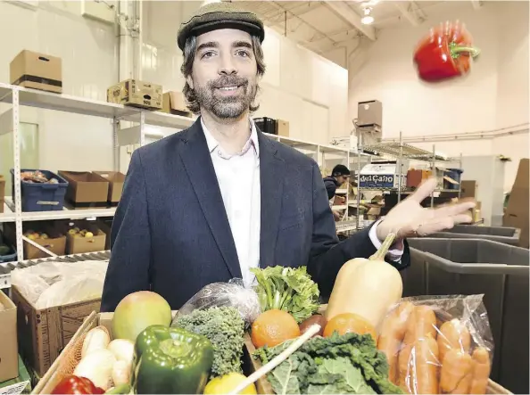  ?? ED KAISER ?? Danny Turner, co-owner of the Organic Box grocery delivery service, is feeling the pinch as food prices rise and the economy slumps.