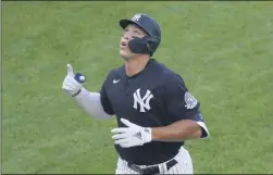  ?? KATHY WILLENS ?? New York Yankees’ Aaron Judge points skyward after hitting a solo home run during the first inning of an exhibition baseball game against the New York Mets, Sunday, July 19, 2020, at Yankee Stadium in New York.