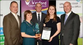  ??  ?? Runner up in the Best Business Idea, Sandra Martin of Bosca Spraoi with Tom Enright, CE, Wexford County Council; Minister Paul Kehoe TD and Tom Banville of LEO.