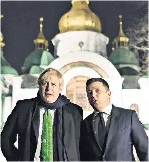  ?? ?? Show of support: Boris Johnson has shown Ukraine’s president, Vlodymyr Zelensky, that Britain is willing to back words with deeds