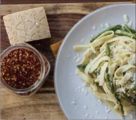  ?? PHOTO BY DENISE WOODWARD ?? Allison Arevalo’s Old School Fettucine Alfredo with Asparagus is an easy and delicious recipe to start your Pasta Friday tradition with family and friends.