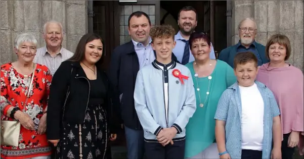  ??  ?? Shay O’Leary who was confirmed by Bishop Denis Brennan in Rowe Street Church recently, with mebers of his family.