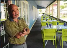  ?? DANA JENSEN/THE DAY ?? Owner Jon Kodama talks about the recent renovation­s of his Go Fish restaurant while standing in the restaurant’s new outdoor dining area. The restaurant is located in the Olde Mistick Village in Mystic.