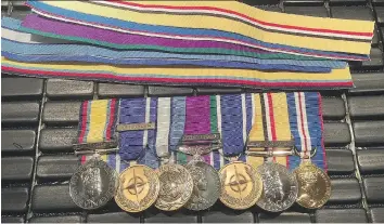  ?? THE CANADIAN PRESS ?? Medals issued for service in various theatres of conflict, including the Gulf War, Bosnia and Iraq, have been stolen from the Kindersley apartment of a retired British Armed Forces veteran.