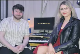  ?? (Pic: John Ahern) ?? FERMOY’S FINEST: Managing director of Hillview Studios in Fermoy, Mike Roche, with talented singer, Karen Comerford, whose debut single, ‘Time’ is being released this week.