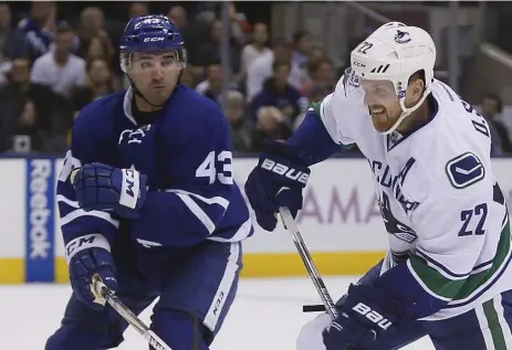  ?? JOHN E. SOKOLOWSKI/USA TODAY SPORTS ?? Nazem Kadri, left, had the Canucks chasing him Saturday after what he called a “shoulder-to-shoulder hit” on Vancouver’s Daniel Sedin.