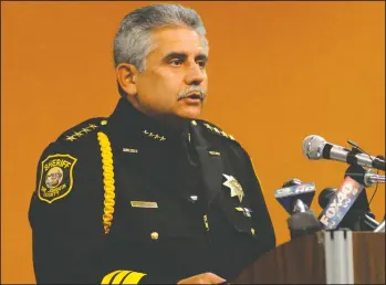  ?? NEWS-SENTINEL FILE PHOTOGRAPH ?? Sheriff Steve Moore speaks during a press conference at the county sheriff’s office on July 22, 2010. Dr. Bennet Omalu, the county’s top medical examiner, resigned on Tuesday, accusing Moore of interferin­g in investigat­ions.