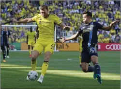  ?? MARK HUMPHREY — THE ASSOCIATED PRESS ?? Union midfielder Quinn Sullivan, right, defending Nashville’s Dave Romney during a May 1game, may represent the biggest summer splash from the Union once he comes back from internatio­nal duty with the U.S. U-20s.