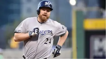  ?? FRED VUICH/THE ASSOCIATED PRESS ?? First baseman Adam Lind, acquired by the Seattle Mariners on Wednesday, hit 20 homers for Milwaukee in 2015.