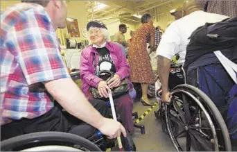  ?? Photog raphs by Genaro Molina Los Angeles Times ?? TIRELESS CHAMPION Bea Cohen speaks with Marine veteran Larry Foster at the Department of Veterans Affairs in North
Hills in 2012. Cohen spent more than 70 years supporting U.S. military organizati­ons and charities.