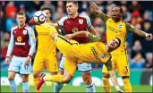  ??  ?? IN THE AIR: Brighton’s Beram Kayal battles with Burnley’s Sam Vokes