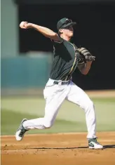  ?? Michael Zagaris / Getty Images 2019 ?? Shortstop Logan Davidson, shown at the Coliseum last year, was the A’s firstround pick in 2019. Farm director Ed Sprague praised Davidson’s play in the instructio­nal league.