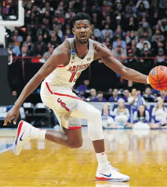  ?? KEVIN C. COX/GETTY IMAGES ?? Arizona centre Deandre Ayton is arguably the best choice as the player the Phoenix Suns should build around.