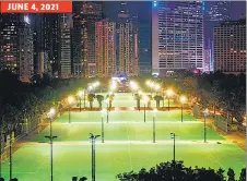  ??  ?? THEN AND NOW: A June 4, 1990 photo (left) shows a packed Victoria Park in Hong Kong during a vigil; the site (right), cordoned off, stands empty on June 4, 2021.