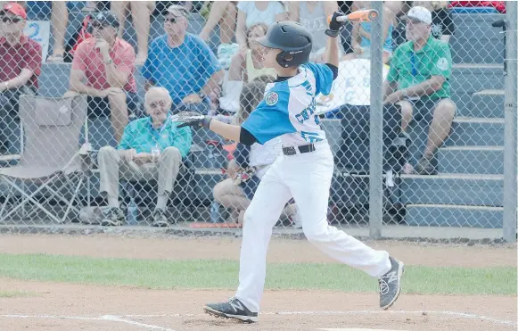  ?? RYAN MCCRACKEN/MEDICINE HAT NEWS ?? Right fielder Kyle Chyzowski’s home run helped White Rock-South Surrey romp to a 23-4 victory against the Port Arthur Nationals at Lovell McDonnell Field on Sunday during the national championsh­ip.