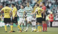  ??  ?? 0 Referee Fesnic gives Jozo Simunovic his marching orders.