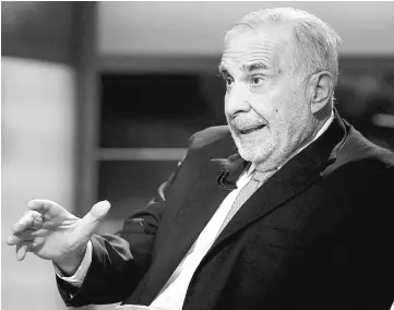  ??  ?? Billionair­e activist-investor Carl Icahn gives an interview on FOX Business Network’s Neil Cavuto show in New York, US on Feb 11, 2014. Icahn, special adviser to Donald Trump, said there are others on the president-elect’s team who have deeper...