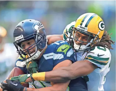  ?? JOURNAL SENTINEL FILES ?? Tramon Williams’ first stint in Green Bay ended after Seattle Seahawks receiver Jermaine Kearse hauled in the winning touchdown pass in overtime against him in the 2014 NFC title game.