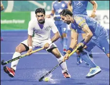  ?? AP ?? India's Akashdeep Singh (right) during the bronze medal playoff against Pakistan in Jakarta on Saturday.