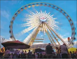  ?? Michael Goulding UPI ?? THE OC FAIR BOARD voted in May to f ly the rainbow pride f lag at the fairground­s. Three days after the flag was raised for the first time, it was stolen.