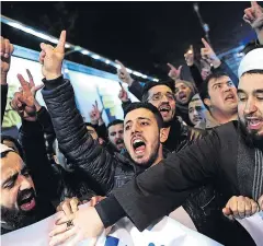  ?? AFP ?? Muslims protest against the publicatio­n by Turkish daily “Cumhuriyet” of a a four page pullout containing cartoons and articles from the “Charlie Hebdo” issue, on Wednesday.