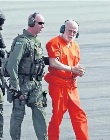  ?? STUART CAHILL / BOSTON HERALD FILE ?? QUESTIONS REMAIN: James ‘Whitey’ Bulger is escorted from a Coast Guard helicopter after court in Boston in 2011.