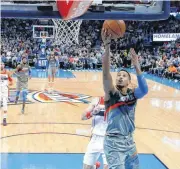  ?? [PHOTO BY BRYAN TERRY, THE OKLAHOMAN ARCHIVES] ?? While Andre Roberson only played 39 games last season, on a per possession basis, no wing in the NBA made cuts to the basket at a higher frequency than his 29.7 percent. Here he goes to the basket against the Washington Wizards on Jan. 25.