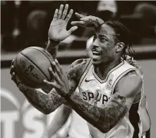  ?? Billy Calzada / Staff photograph­er ?? As the best player on an 18-14 team, DeMar DeRozan probably has more value to the Spurs as a keeper than as trade bait.