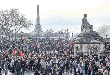  ?? AFP ?? People rally against pension reform at Place de la Concorde in Paris on Thursday.