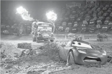  ??  ?? Lightning McQueen, voiced by Owen Wilson, in a scene from Pixar’s Cars 3.
