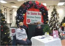  ?? Photos by Matthew Liebenberg/Prairie Post ?? Christmas kettle volunteers Betsey Ryan (at left) and Sharlene Holderbein were helping out at the Christmas Room, Nov. 22.