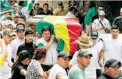  ?? Daniel Walker / AFP via Getty Images ?? The coffin of Marcelo Terrazas Seleme, who died in a Bolivian protest, is carried at his funeral Thursday.