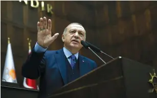  ?? (Murat Cetinmuhur­dar/Presidenti­al Palace/Reuters) ?? TURKISH PRESIDENT Tayyip Erdogan addresses members of the parliament from his AK Party in Ankara yesterday.