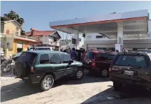  ?? HAROLD ISAAC For the Miami Herald ?? A fuel shortage in Haiti has drivers and companies worried, as gas stations shut down because of a lack of diesel and gas.