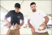  ?? Arnold Gold / Hearst Connecticu­t Media file photo ?? Ryan Magnotti, left, and Jesse Balliu compete in the potato-peeling competitio­n at the Potato and Corn Festival in North Branford on Aug. 4, 2018.