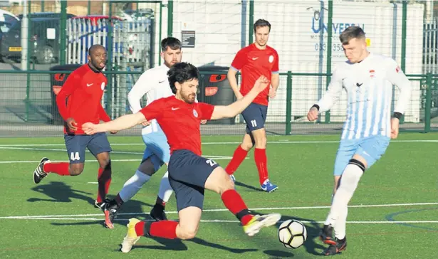  ??  ?? ●●Action from AFC Oldham seconds against Trafford United seconds (United in red)