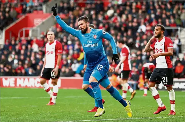  ?? — Reuters ?? Super sub: Arsenal’s Olivier Giroud celebratin­g after scoring the equaliser against Southampto­n yesterday.