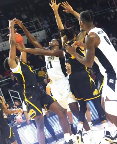  ?? Photos by Ernest A. Brown ?? Providence guard Alpha Diallo (11, above) and Makai Ashton-Longford (below) helped the Friars finish the preseason with an 8255 victory over Division II Bowie State at the Dunkin’ Donuts Center. Diallo had 12 points and five rebounds.