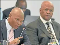  ?? Picture: TREVOR SAMSON ?? QUESTIONIN­G: ChiefJusti­ce Mogoeng Mogoeng and Justice Minister Jeff Radebe at the JSC interviews yesterday.