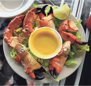  ?? TNS ?? Everglades City, Fla., is the Stone Crab Capital of the World. Crab claws are served in restaurant­s in season, mid-October to mid-May.