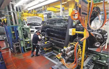  ?? AFP ?? A Mercedes Benz production line in Rastatt, Germany. Many of the country’s large companies have been hit hard by a cooling global economy and trade disputes.